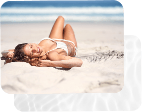 Breast Augmentation Stamford 7 Model laying on the beach